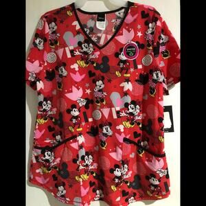 DISNEY SHORT SLEEVE BLOUSE SIZE SMALL. NEW WITH TAGS.